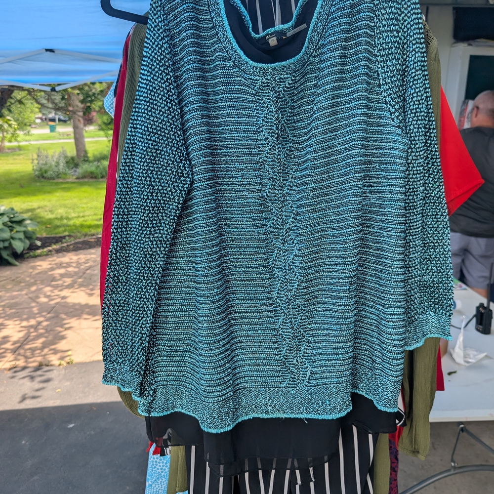 Elegant Teal Sweater with Textured Design